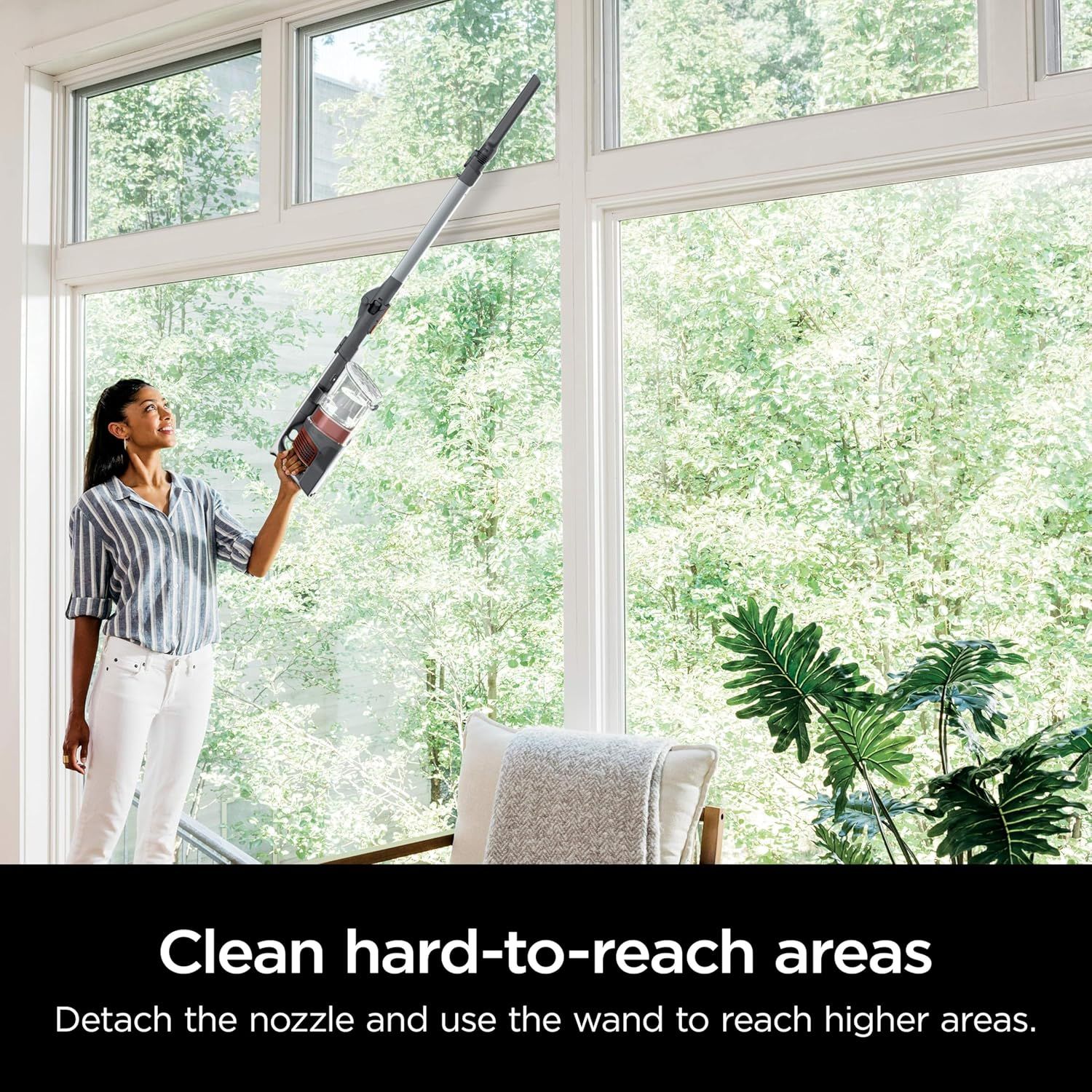 Demonstrates how to use the detachable wand feature to clean hard-to-reach areas like high windows and ceilings, reassuring shoppers of the product's…