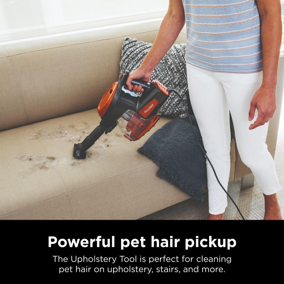 Demonstrates the vacuum's effectiveness at cleaning pet hair from upholstery, reassuring pet owners that the product solves a common pain point.