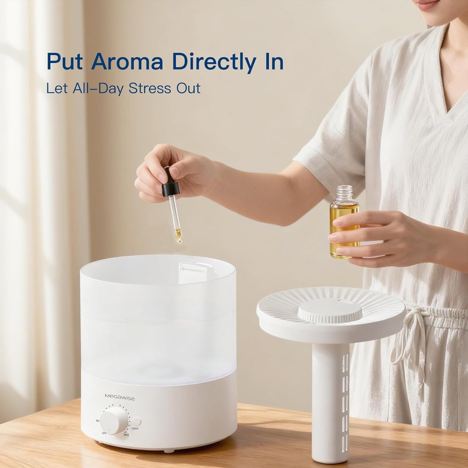 Demonstrates how to use the aromatherapy diffuser by adding essential oils directly into the device, showing the simple setup process to help shoppers…