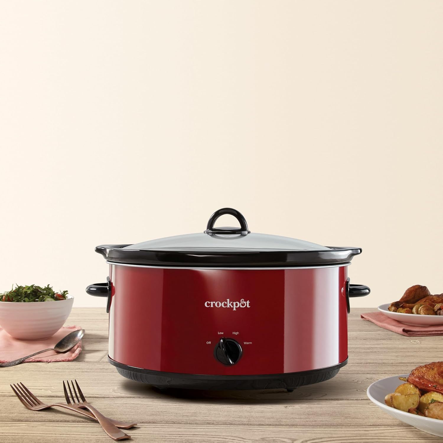 Showcases the Crockpot slow cooker in a real-world dining setting to help shoppers visualize the product in their own home and understand its role in meal…