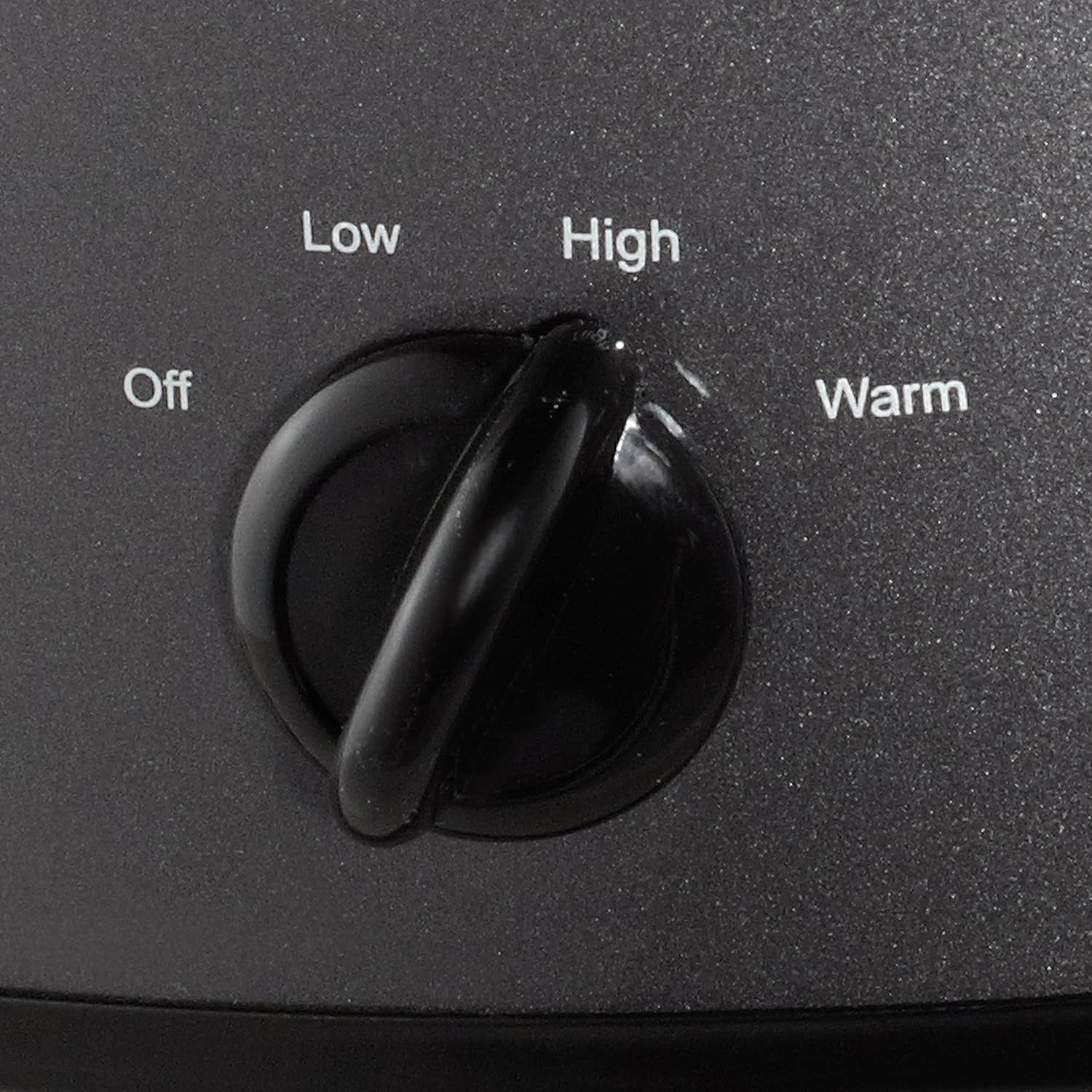 Shows the product's control interface with labeled settings (Off, Low, High, Warm) to help shoppers understand how to operate the appliance and what…