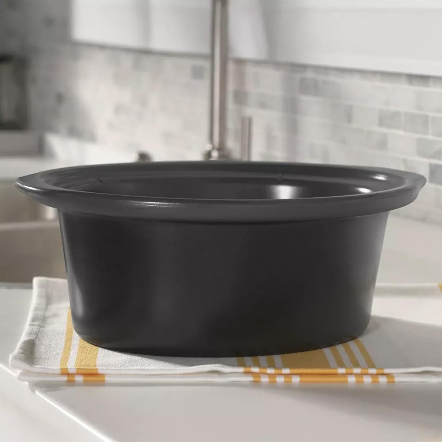 Shows the product in a real-world kitchen setting to help shoppers visualize how it would look and fit in their own home.
