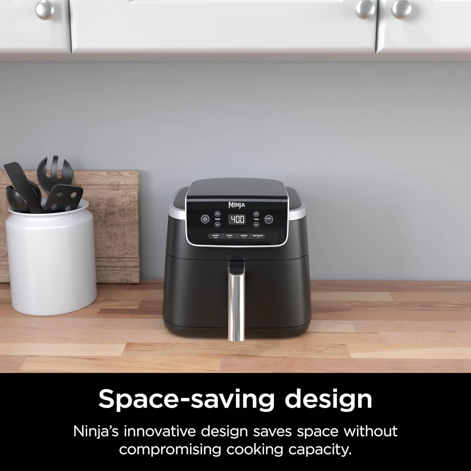 Communicates that the Ninja air fryer has a compact, space-saving design that fits easily on countertops without sacrificing cooking capacity, reassuring…