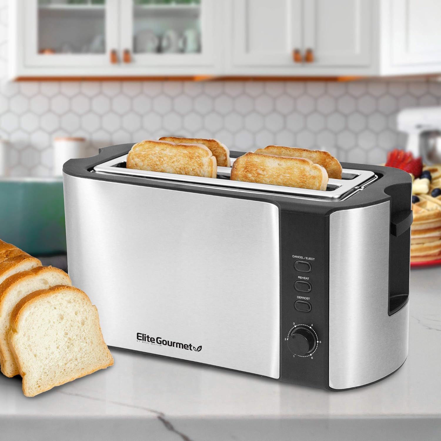 Shows the toaster in a real-world kitchen setting with toasted bread to help shoppers visualize the product in their own home and see it in action.