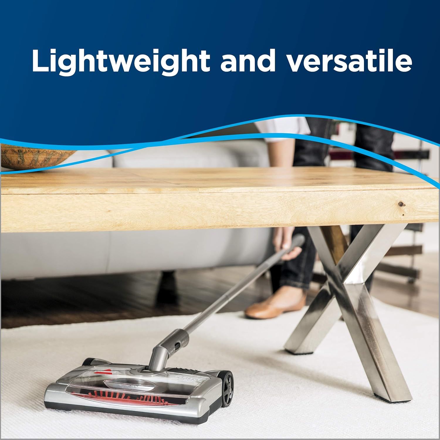 Demonstrates the vacuum's lightweight and versatile design, showing it can easily maneuver under furniture and in tight spaces to reassure shoppers of its…