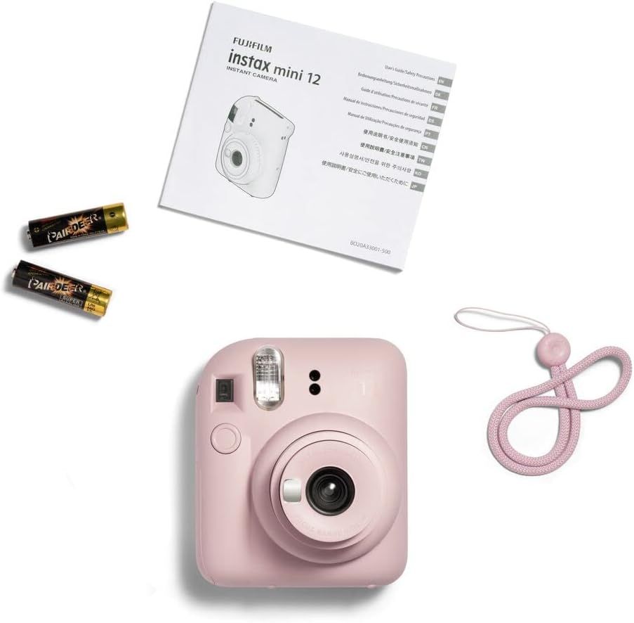 Shows everything included in the package: the Instax Mini 12 camera, instruction manual, batteries, and carrying strap, helping shoppers understand the full…
