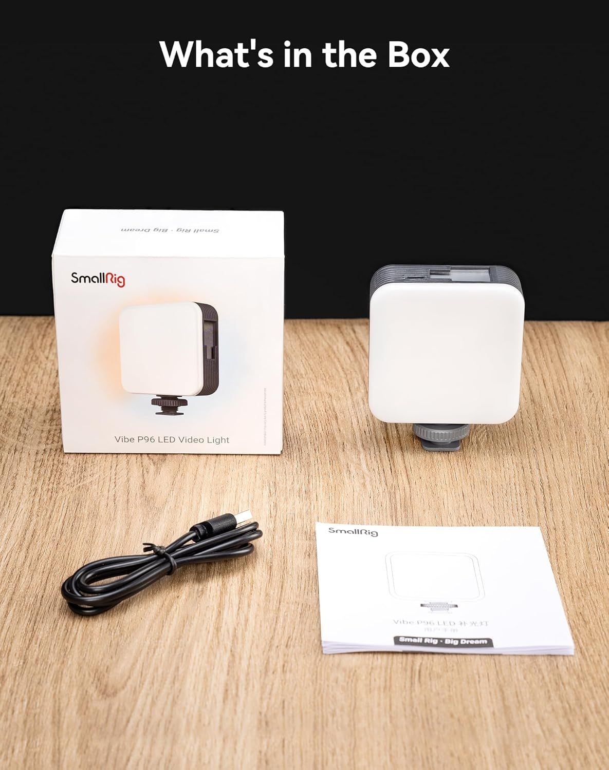 Shows everything included in the box to reassure shoppers they're getting a complete kit with the LED video light, charging cable, and instruction manual.