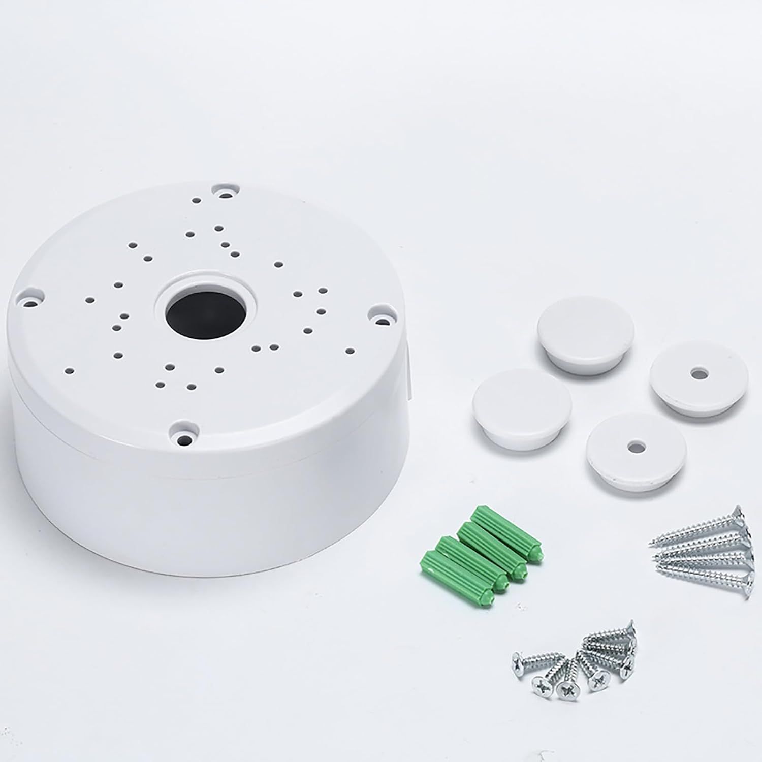 Shows all components included with the camera mounting bracket to reassure customers they have everything needed for installation, including the junction box, mounting caps, wall anchors, and screws.