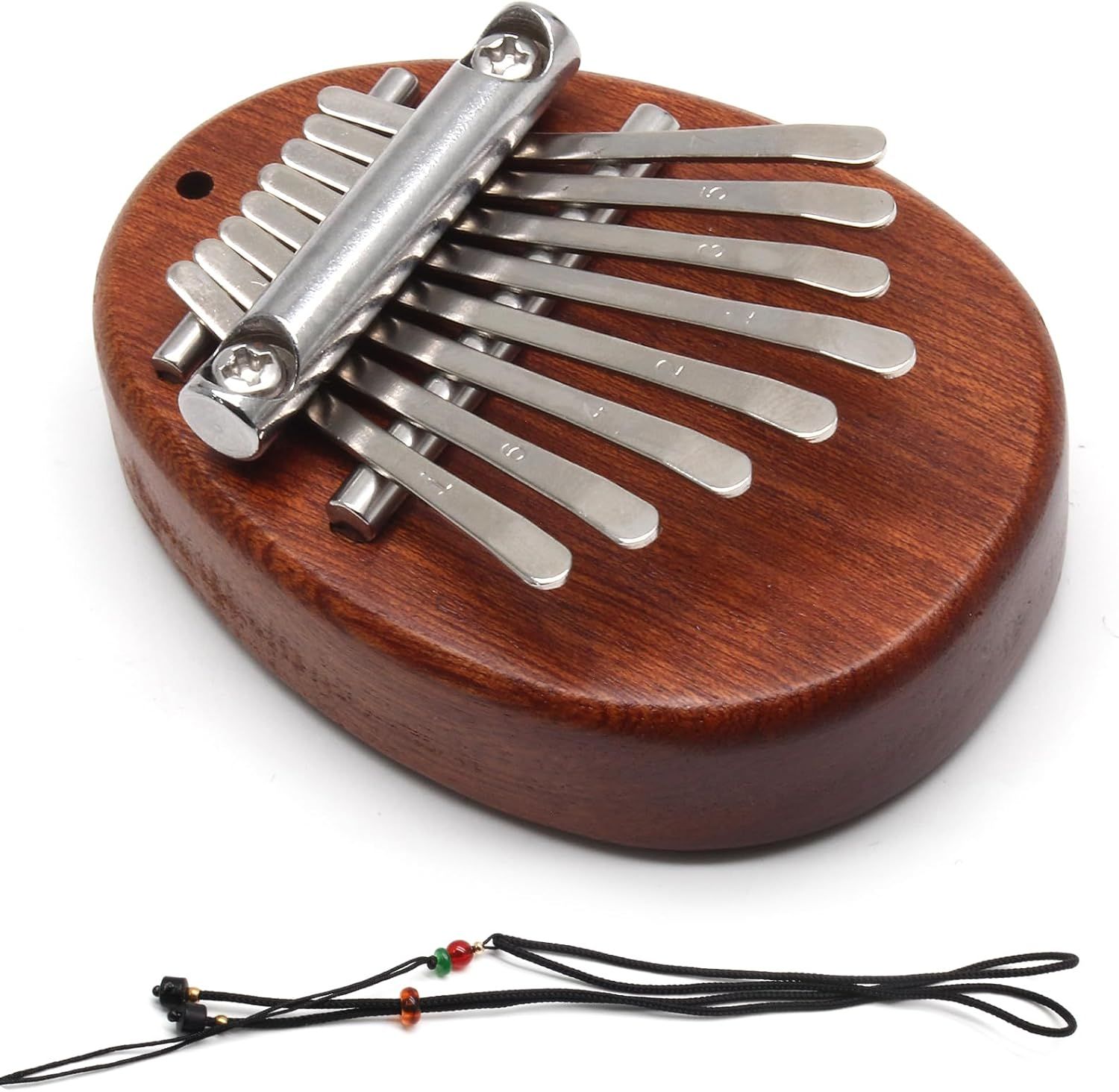 Shows the customer everything included in the purchase: the kalimba instrument with its wooden body and metal tines, plus the decorative carrying strap with beads.