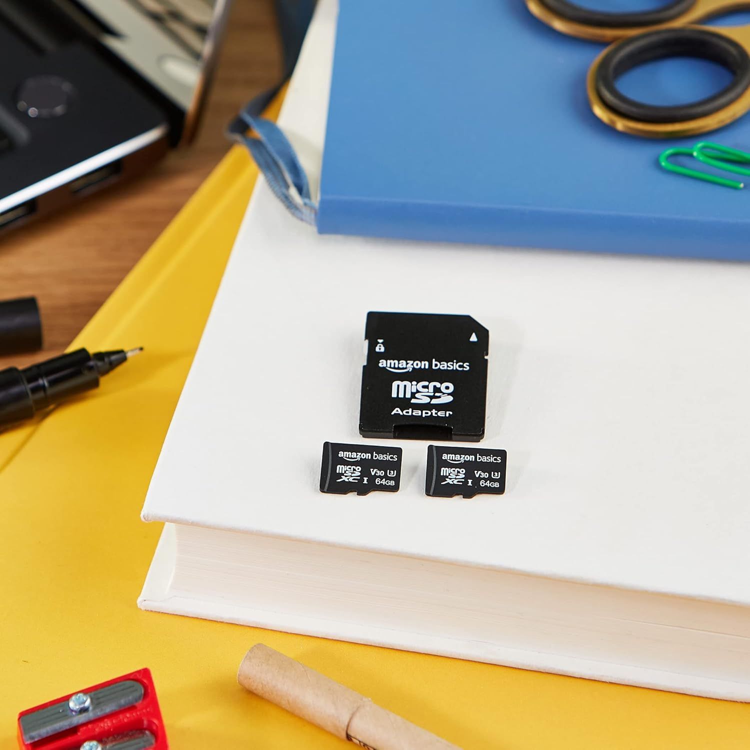 Shows the customer everything included in the package: two microSD cards and one SD adapter, demonstrating the complete value of the purchase.