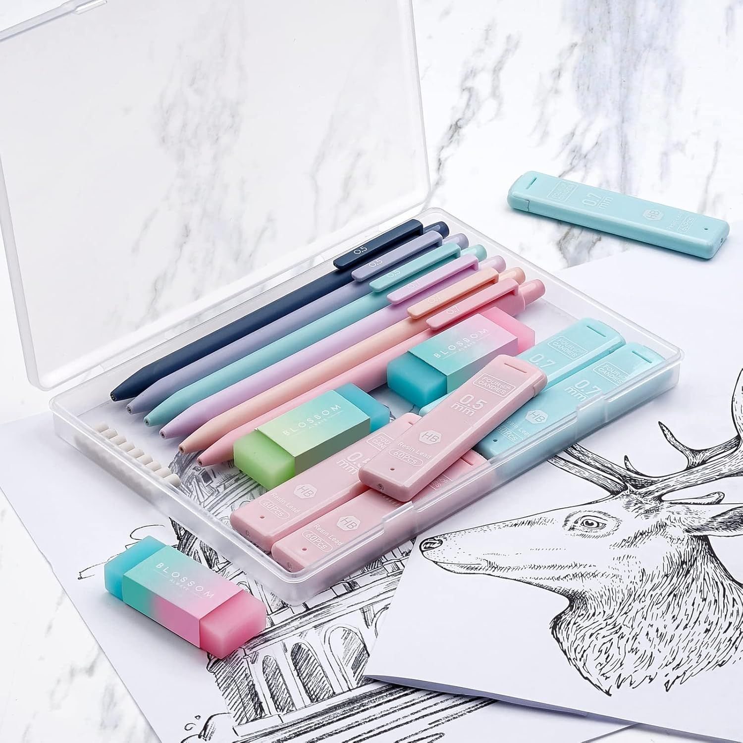 Shows the customer everything included in the purchase—a complete set of pens, erasers, and rulers organized in a clear storage case—to communicate value and…
