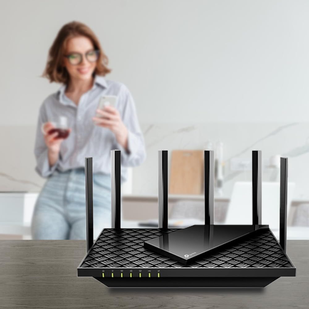 Demonstrates the product in a real-world home environment to help shoppers visualize the router in their own living space and understand its unobtrusive design.