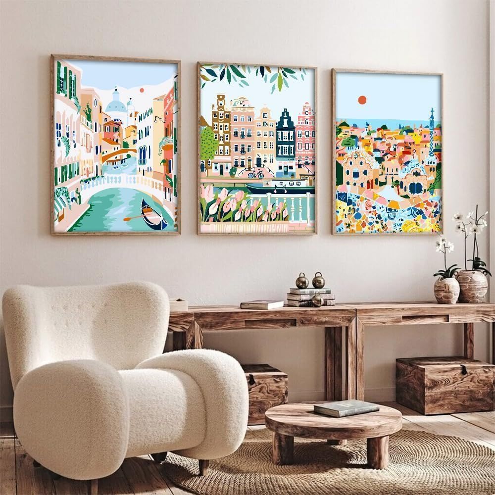 Demonstrates how the product (framed art prints) looks when displayed in a real-world home setting to help shoppers visualize the product in their own space.