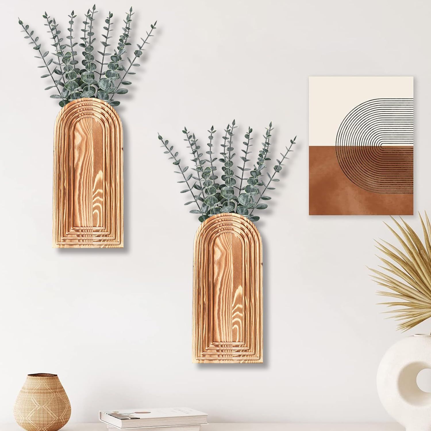 Demonstrates how the product (wooden arch-shaped wall vases) looks when styled in a real home environment, helping shoppers visualize the aesthetic appeal and…