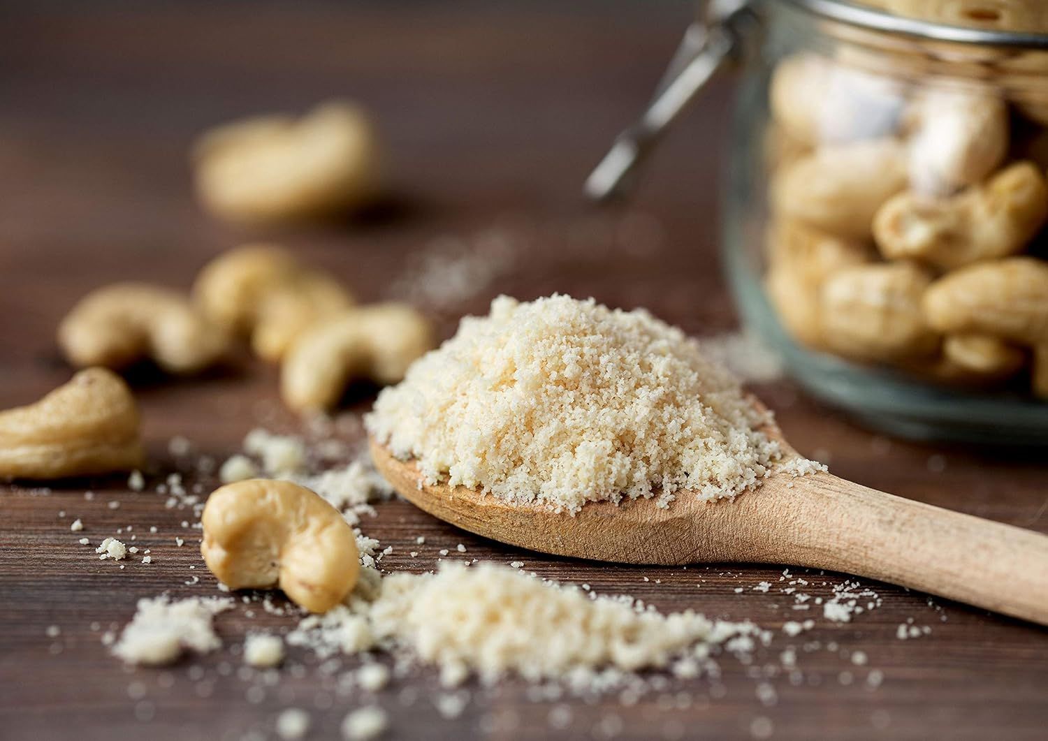 Showcases the product (cashew flour or ground cashews) in an authentic, natural setting to communicate freshness, quality, and the wholesome nature of the…