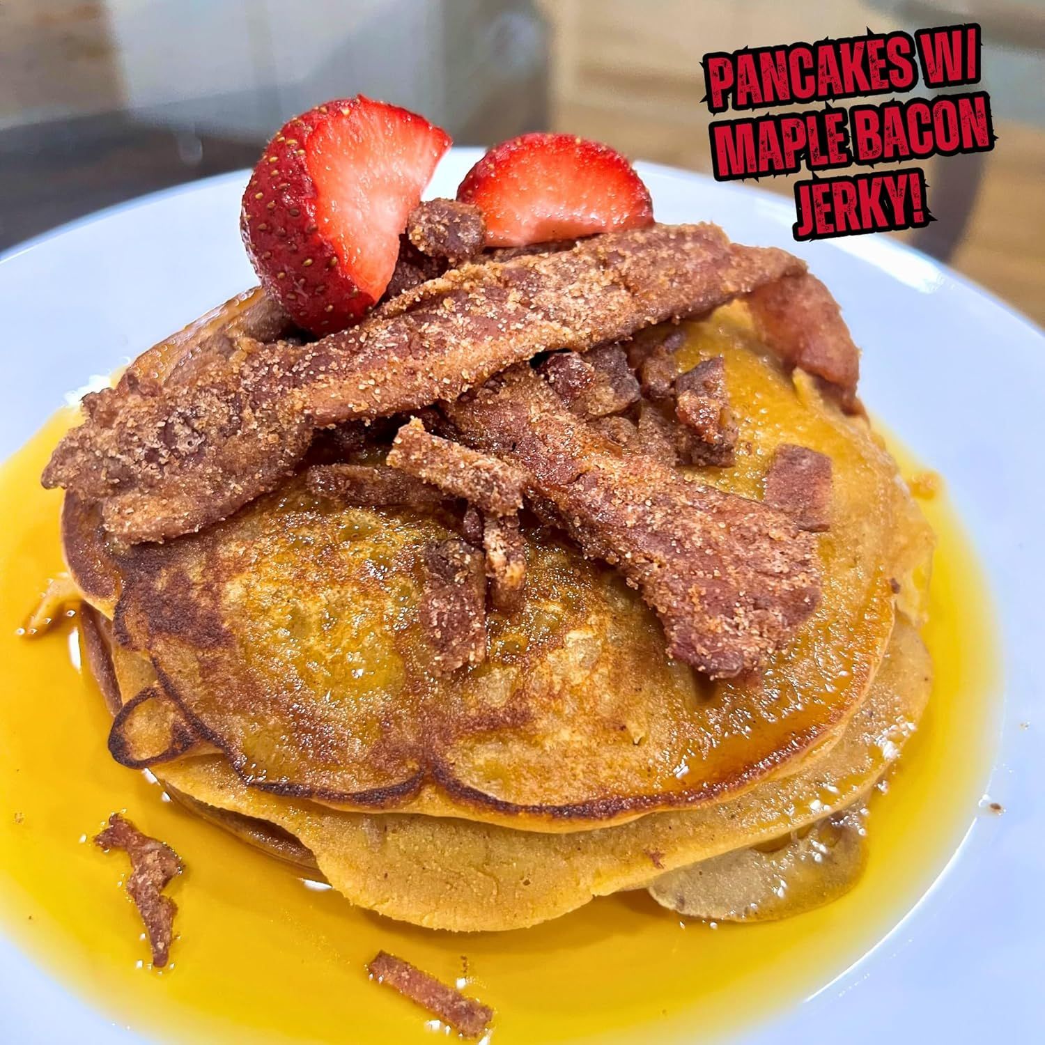 Highlights the distinctive and indulgent flavor pairing of pancakes with maple bacon jerky and strawberries to attract shoppers looking for a unique breakfast…