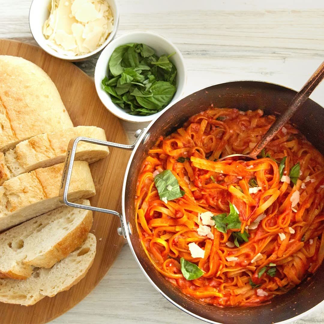 Showcases the product (pasta dish) in an authentic, appetizing real-world setting to help shoppers visualize the meal experience and inspire purchase through…