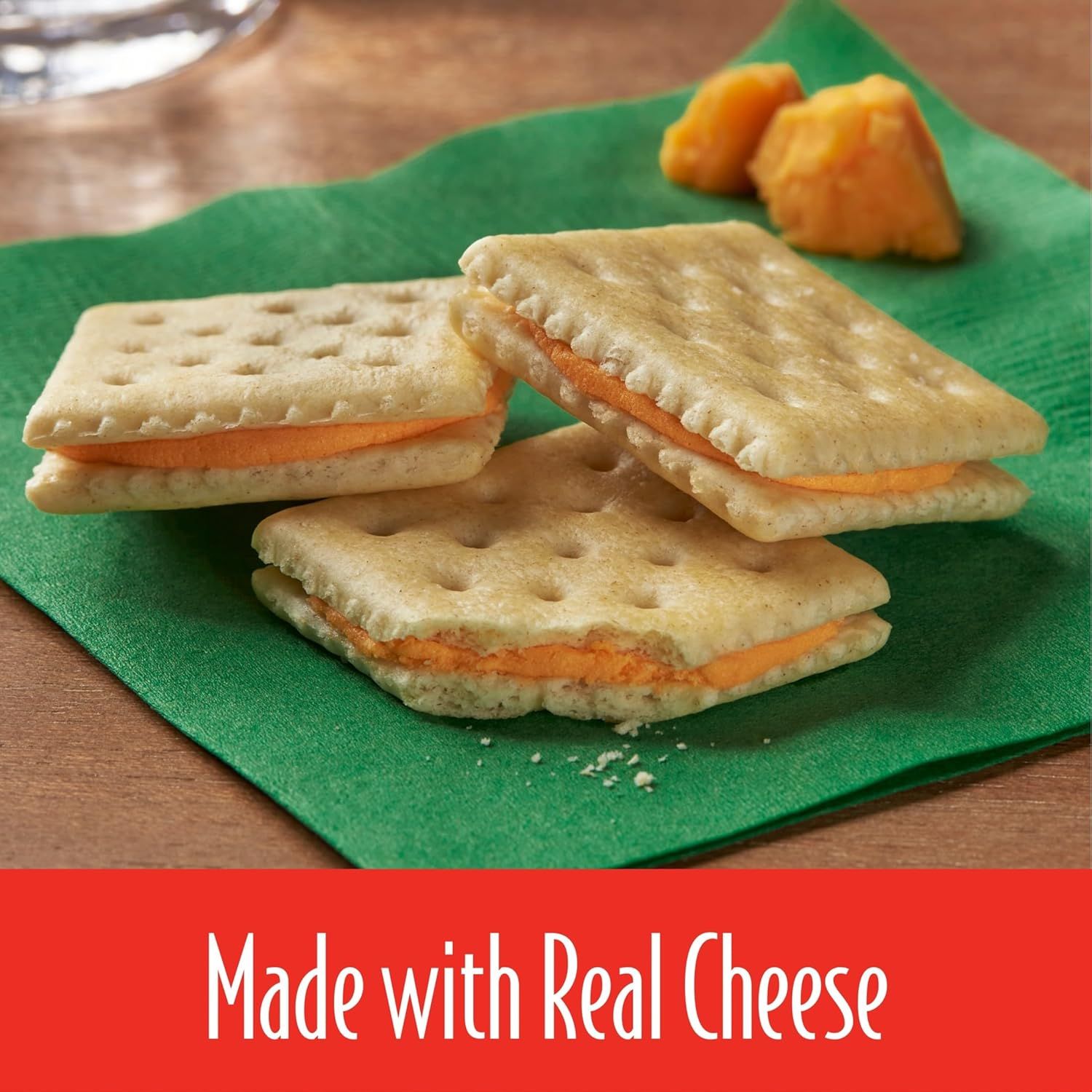 Communicates that the product is made with real cheese to emphasize quality ingredients and authentic taste, reassuring shoppers about the product's premium composition.