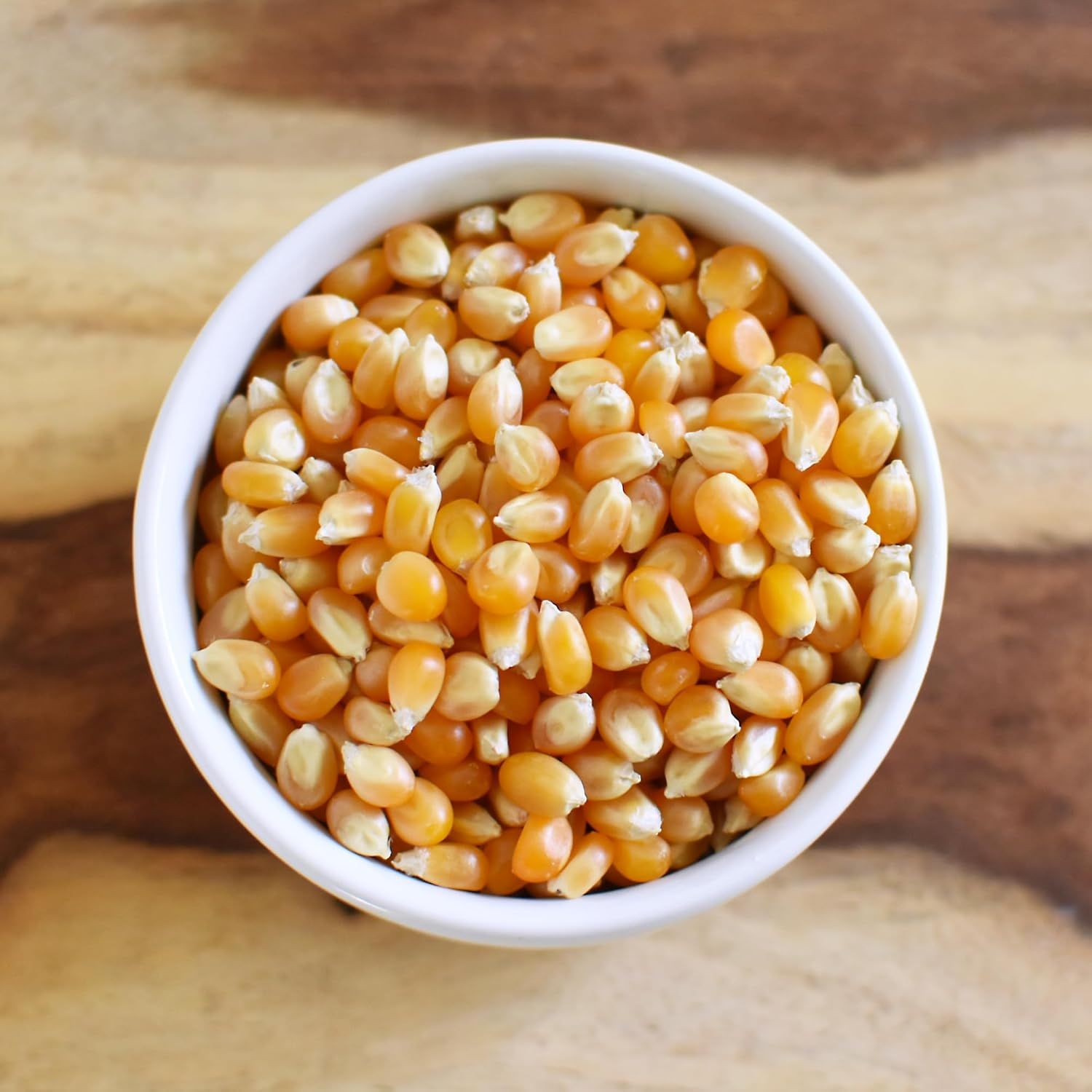 Shows the raw popcorn kernels in a clean, catalog-style presentation to give shoppers a clear view of what the product looks like without distractions.
