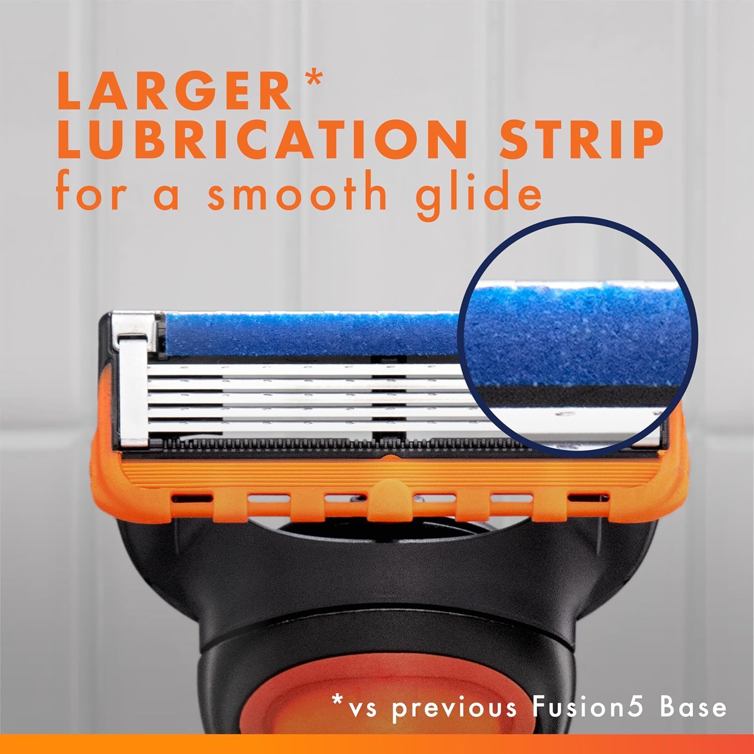 Highlights the enhanced lubrication strip feature of the razor blade, emphasizing its larger size compared to the previous model for a smoother, more…