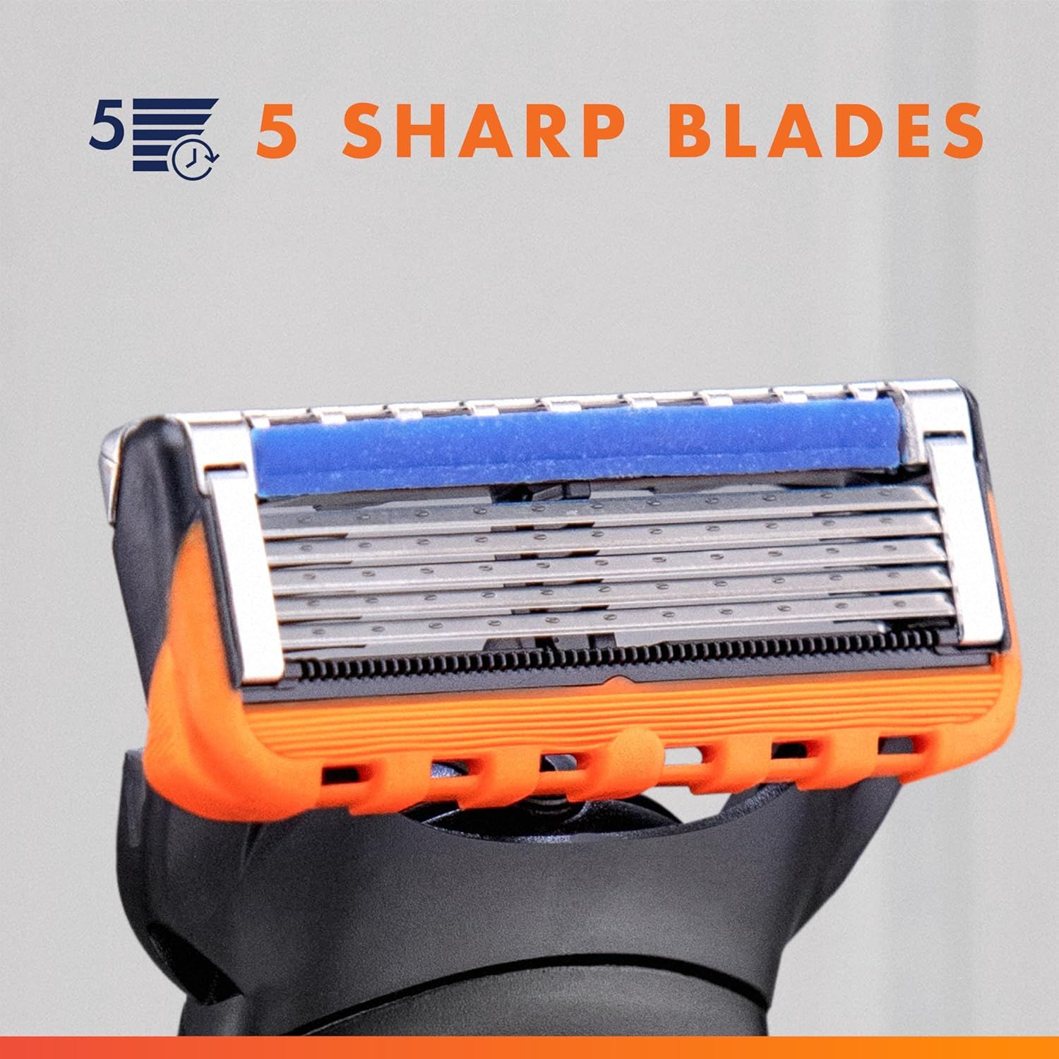Highlights the physical blade structure of the razor cartridge to communicate the product's multi-blade shaving technology and precision.