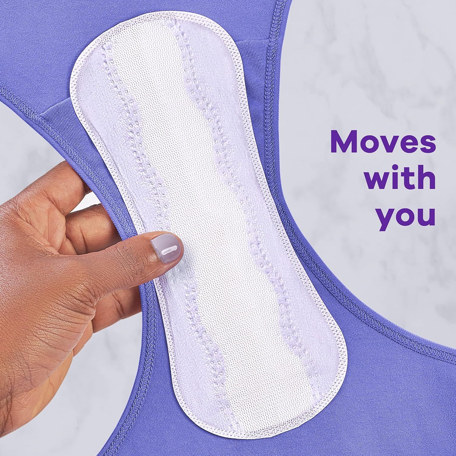 Demonstrates that the pad stays in place and moves naturally with the body during activity, providing comfort and security.