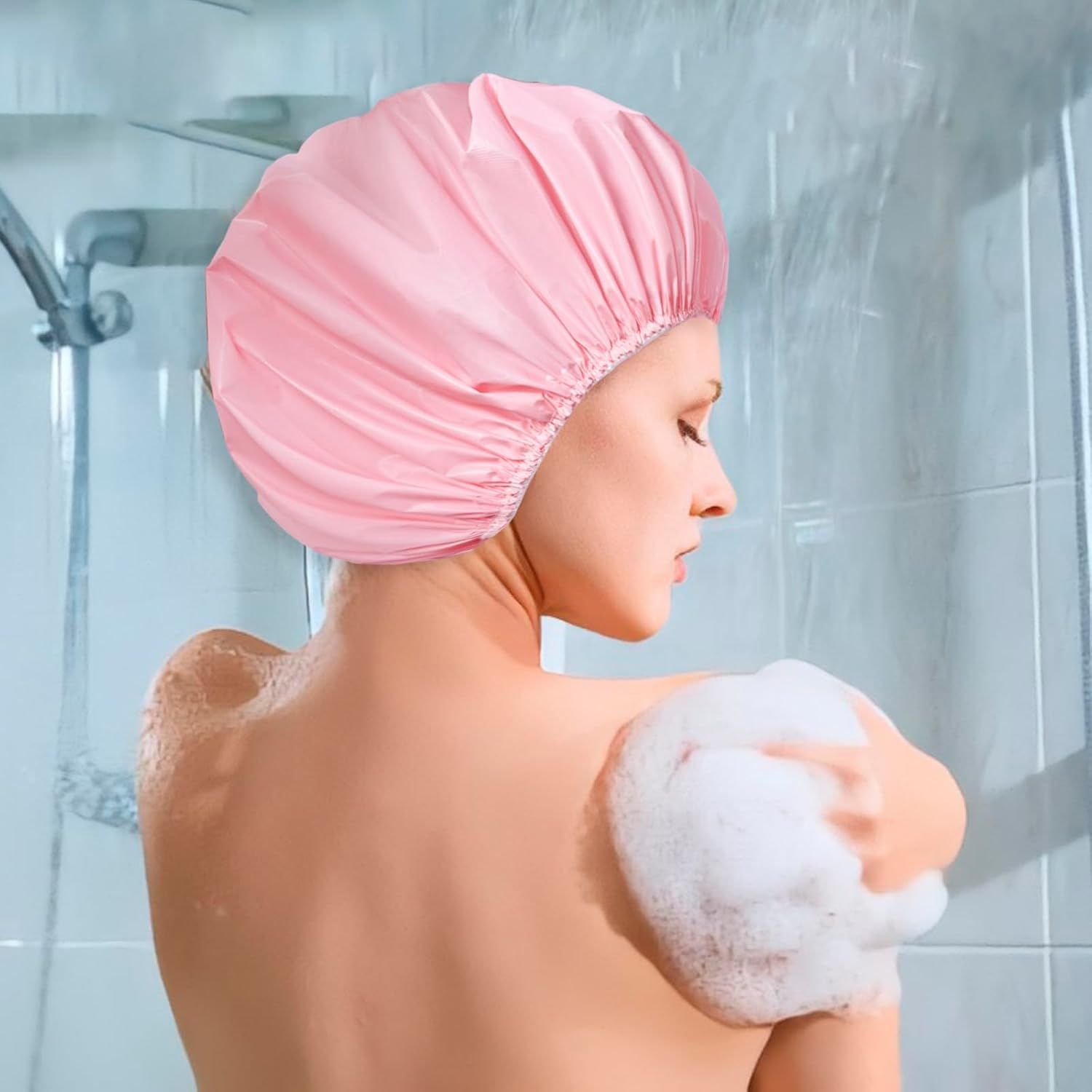 Demonstrates the product being used in a real-world shower setting to help shoppers visualize how the shower cap fits and functions during bathing.