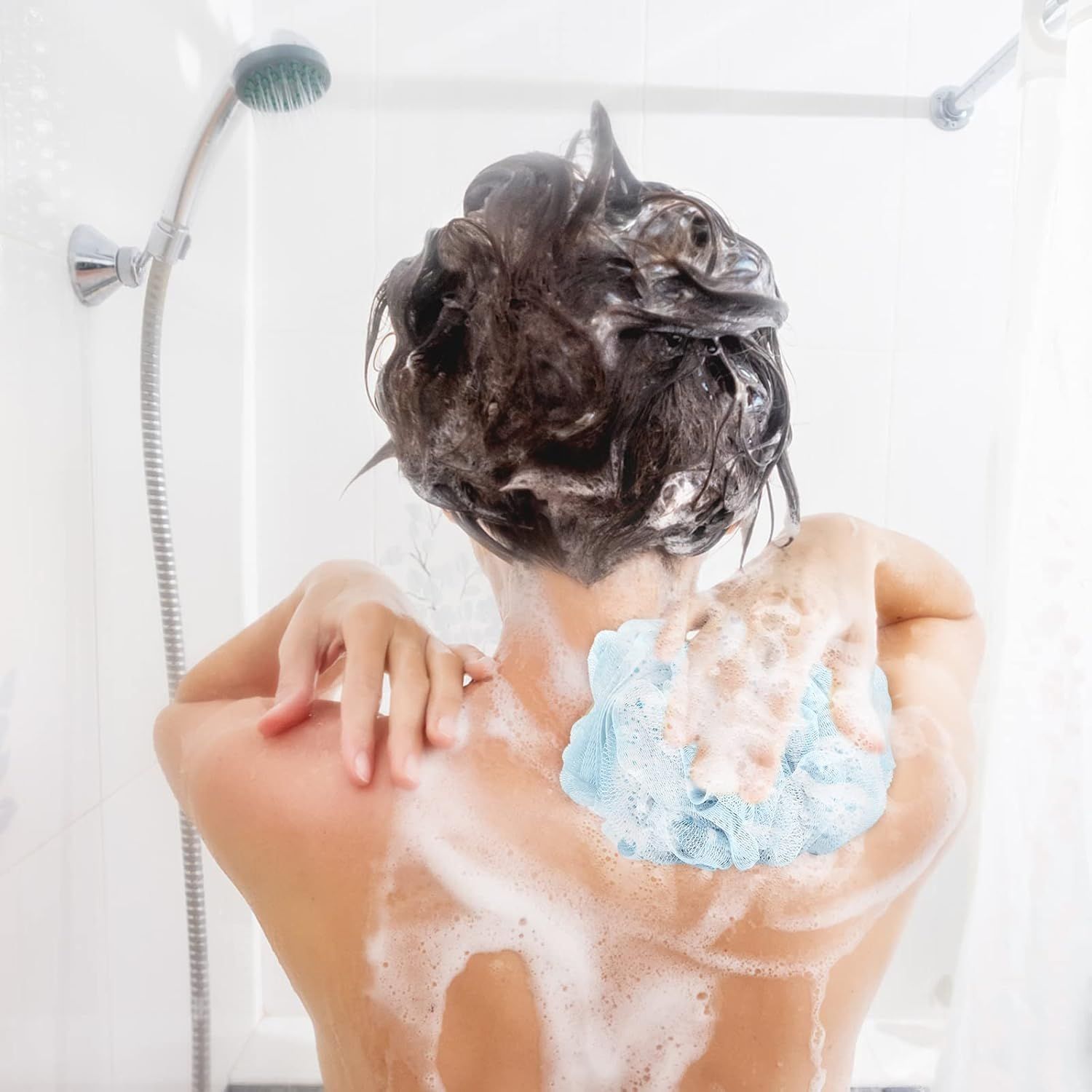 Demonstrates the product being used in a real-world shower setting to help shoppers visualize the product in their daily routine.