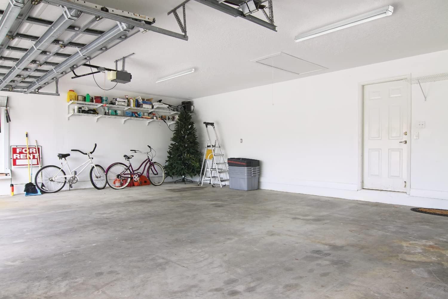 Demonstrates the product in a real-world garage setting, showing how it helps create a clean, organized space with overhead storage and floor space maximization.