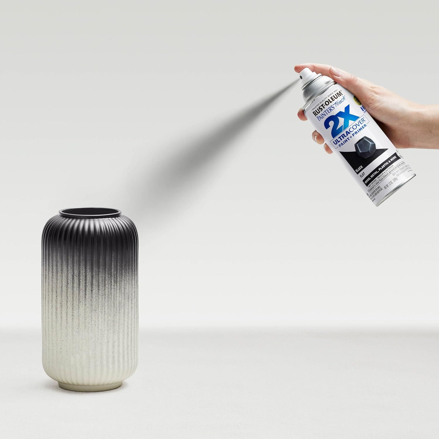 Demonstrates how to apply the spray paint product to achieve a gradient effect, showing the ease of use and application technique. Highlights the product's…