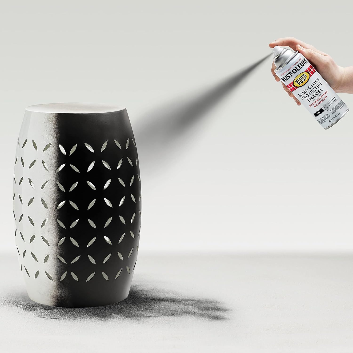 Demonstrates how to apply the Rust-Oleum spray paint product to an object, showing the simple spray-on application method to reassure shoppers about ease of…