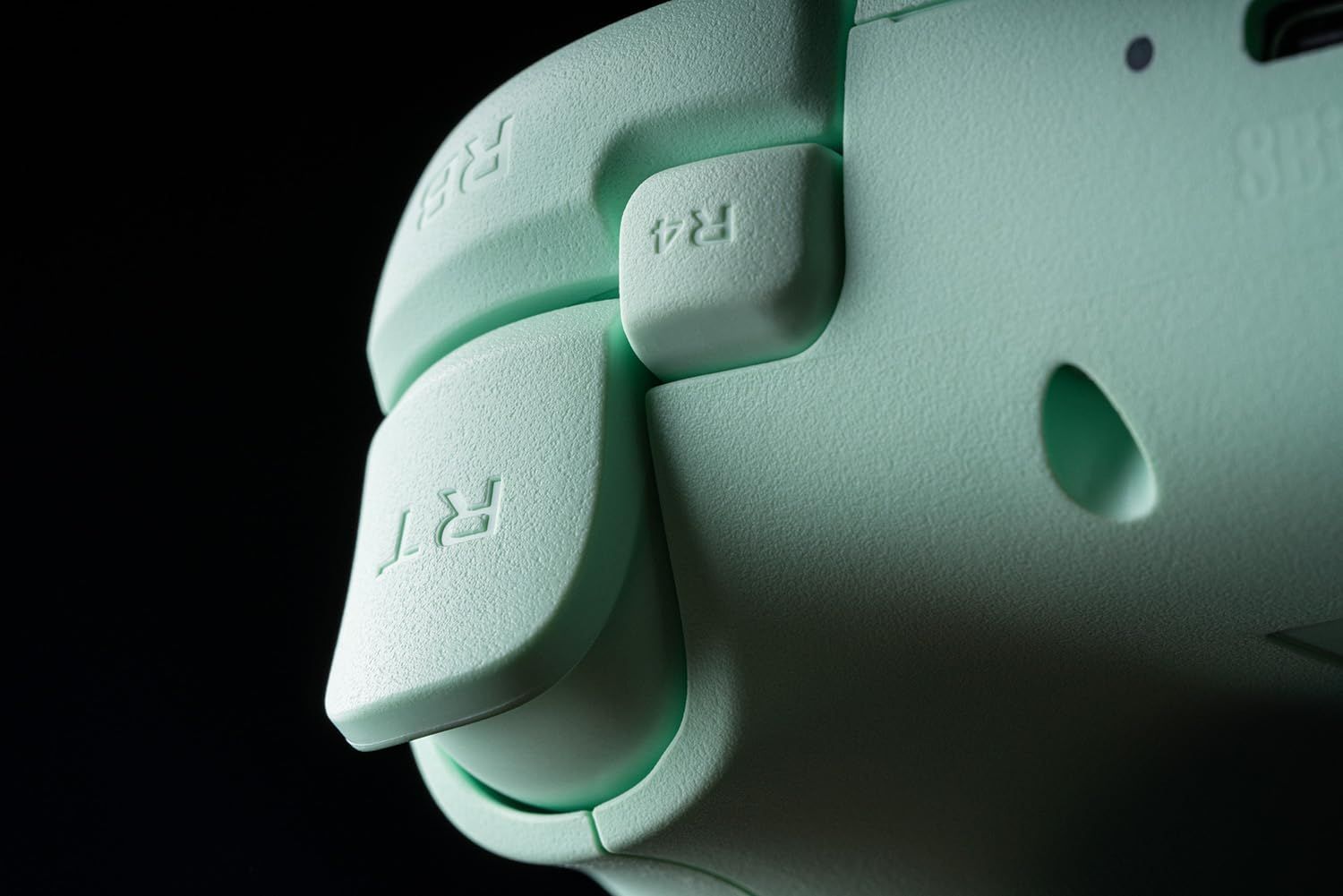 Displays the gaming controller in a clean, professional manner to showcase its design, texture, and button layout without distractions.