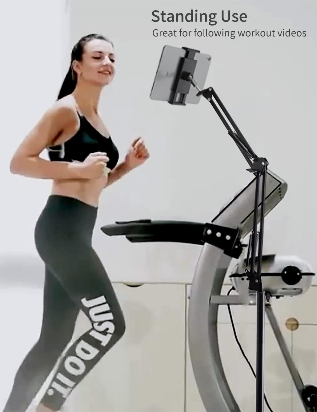 Demonstrates a specific use case for the tablet stand—positioning it for hands-free viewing while exercising on a treadmill, showing shoppers how the product fits into their fitness routine.…