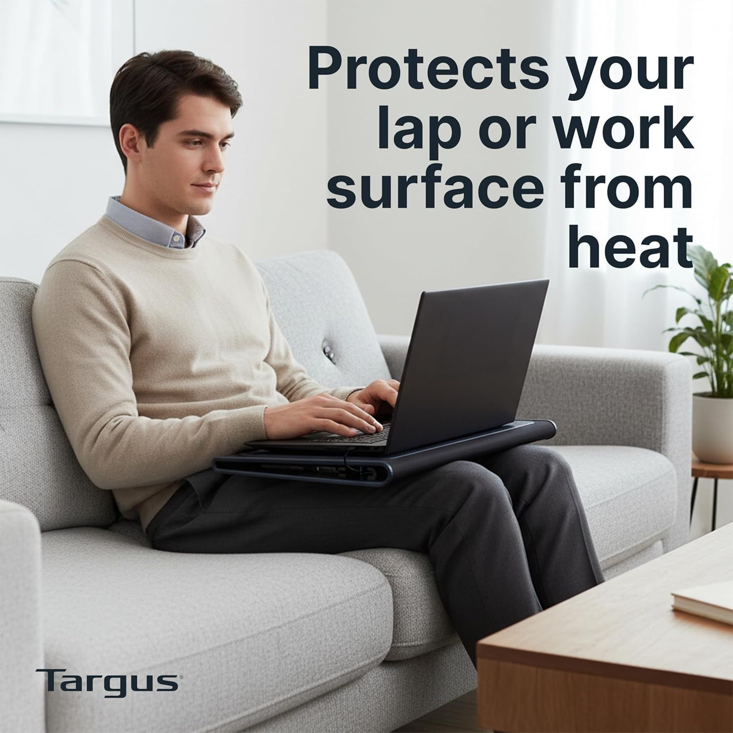 Communicates that the laptop lap desk protects the user's lap and work surface from laptop heat, providing comfort and safety during use.