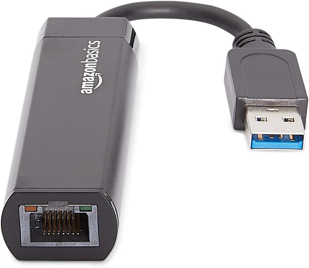 Provides a clean, catalog-style view of the USB to Ethernet adapter showing the product's physical form, connectors, and AmazonBasics branding.