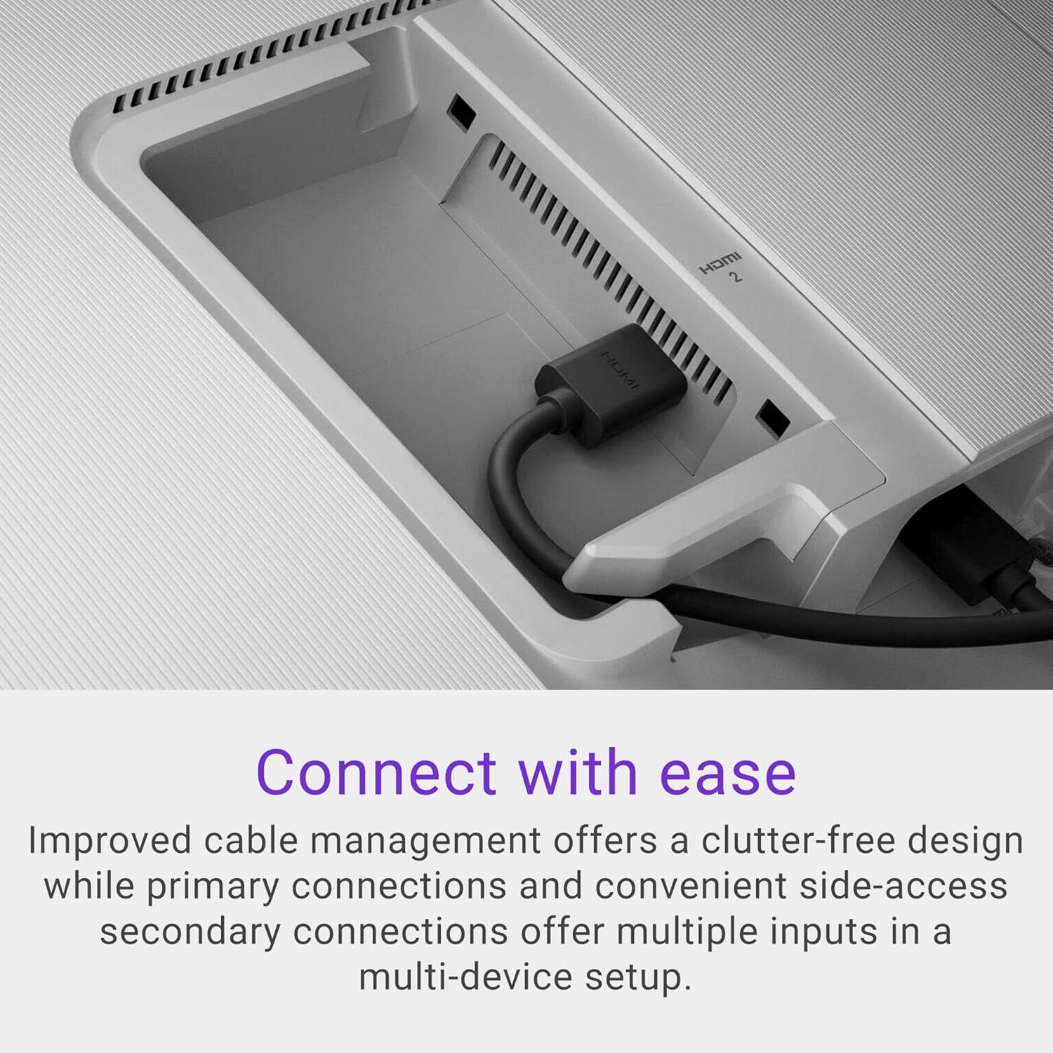 Highlights the product's improved cable management system and convenient side-access ports, reassuring shoppers that the design keeps cables organized and allows easy multi-device connectivity.