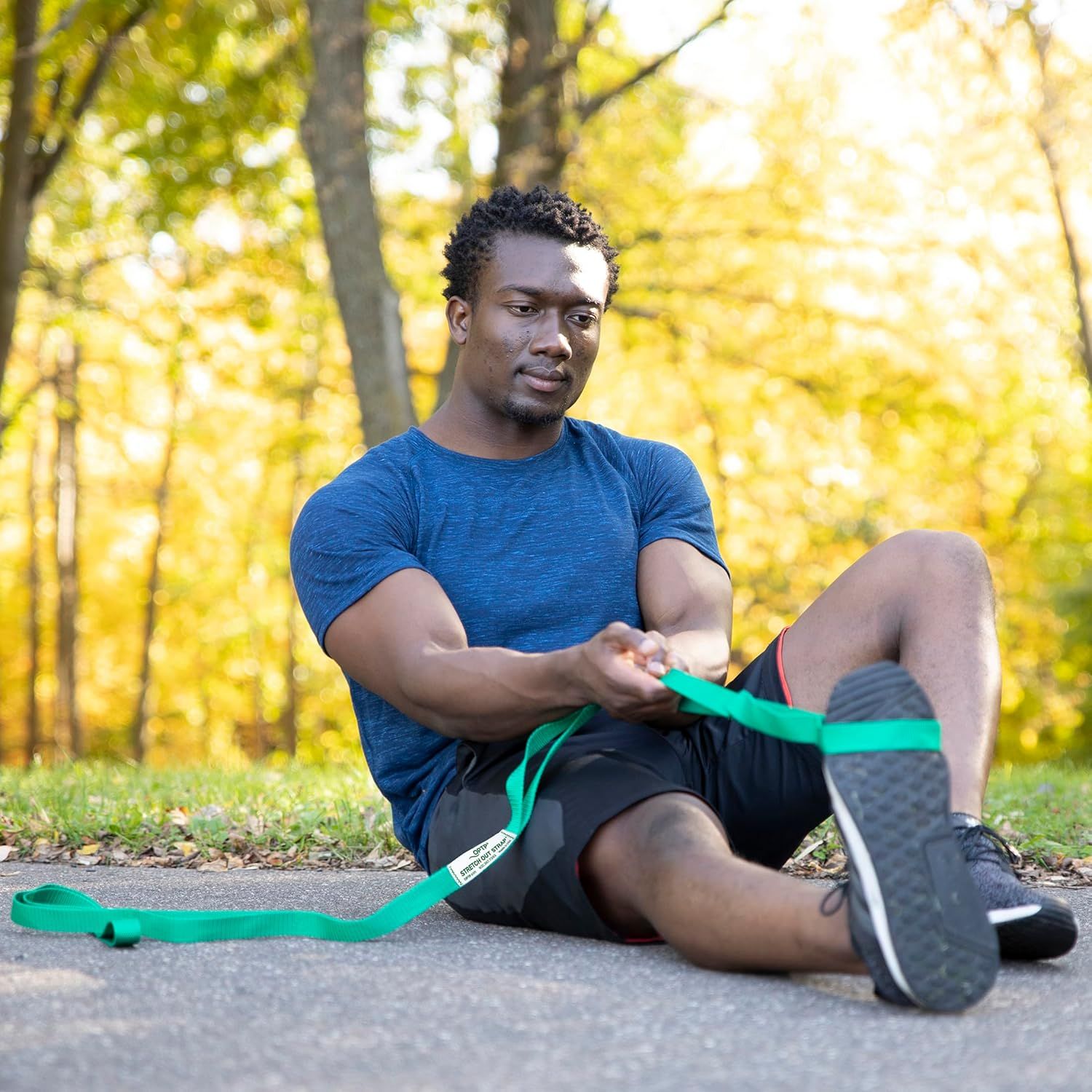 Demonstrates the product being used in a real-world outdoor fitness context to help shoppers visualize themselves using the resistance band in their own…