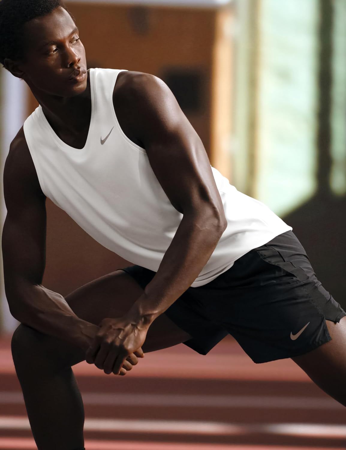 Showcases the product being worn in a real-world athletic context to help shoppers visualize themselves using the product during workouts or training.