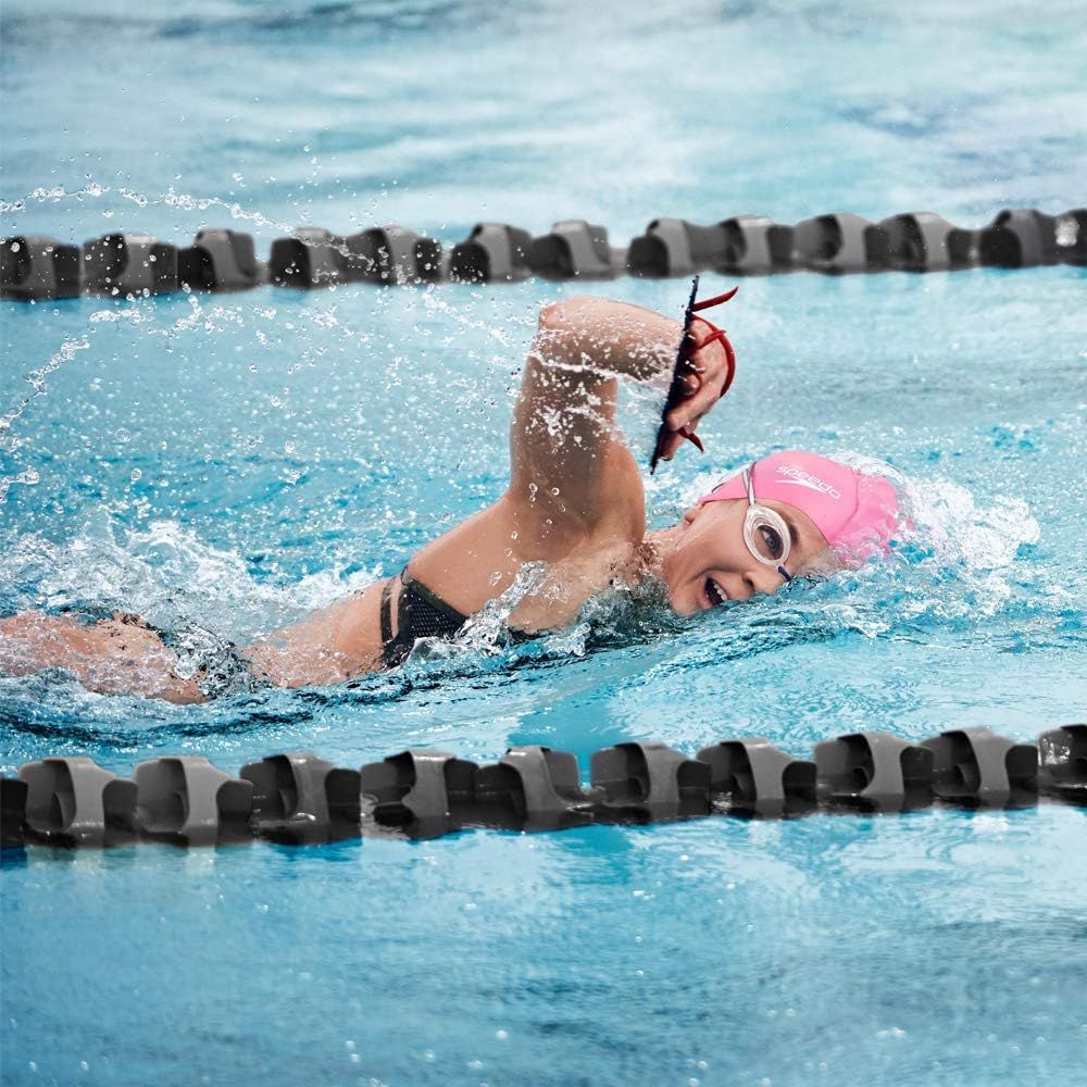 Shows the product in real-world use during swimming, demonstrating its practical application in an authentic pool environment.