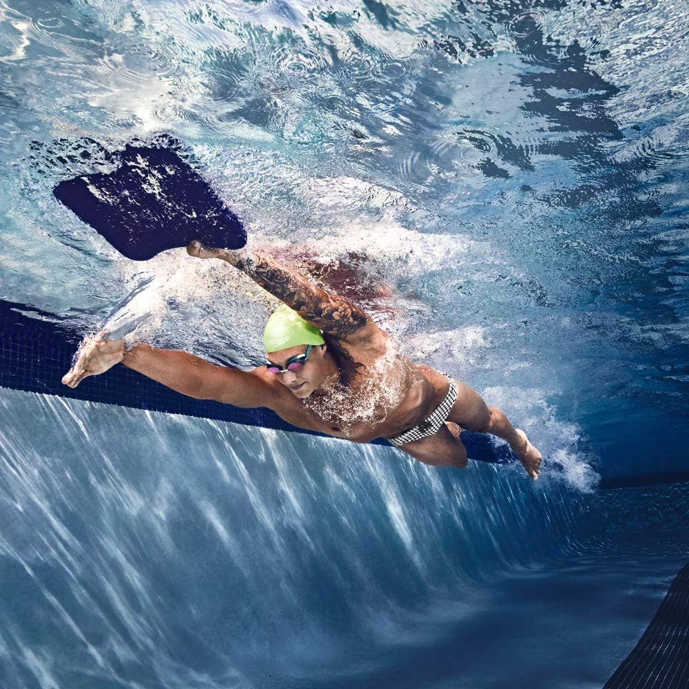 Demonstrates the product in real-world use during swimming to help shoppers visualize themselves using the product in an authentic athletic context.