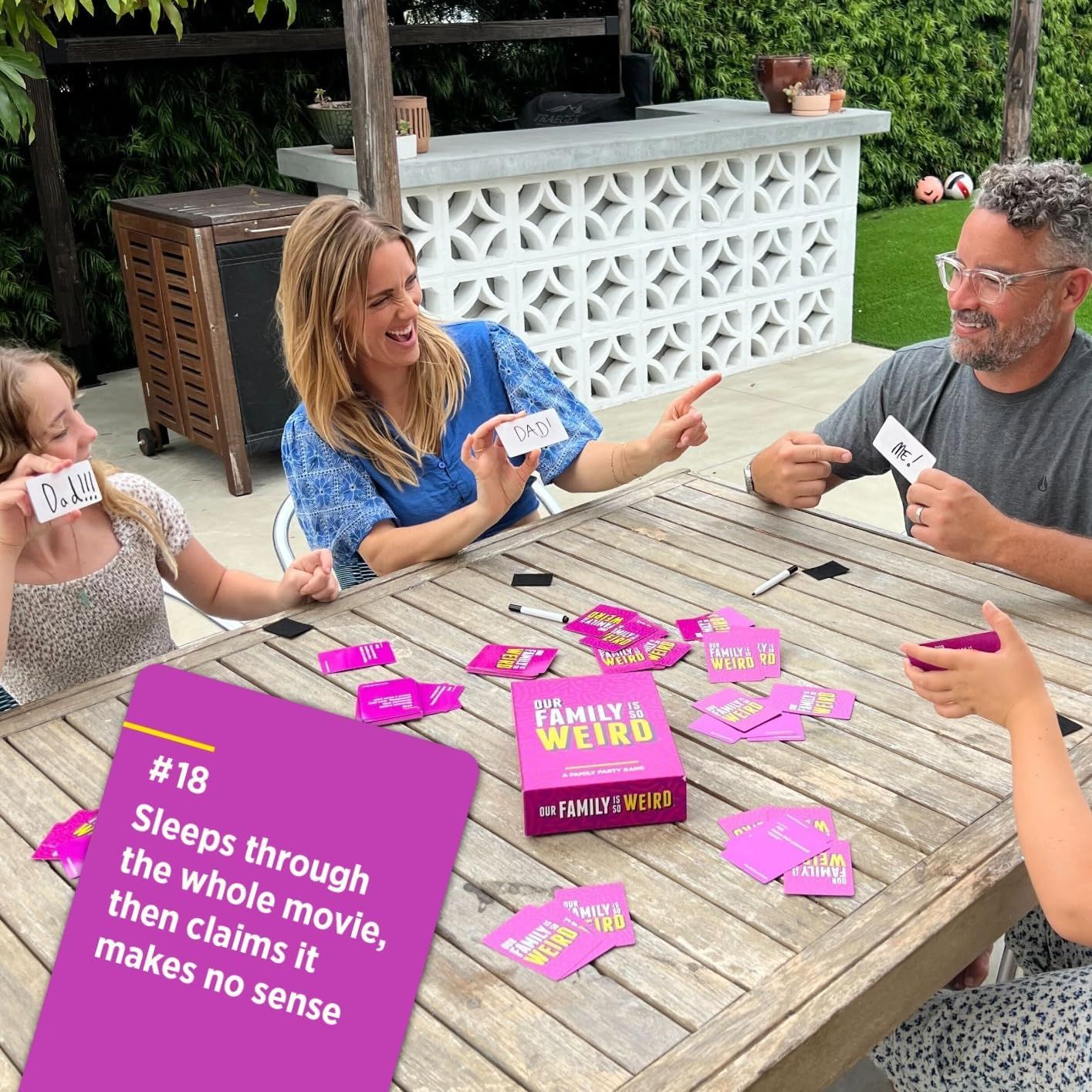 Demonstrates the product being enjoyed by a family in a natural outdoor setting, showing the social and entertainment value of the card game.