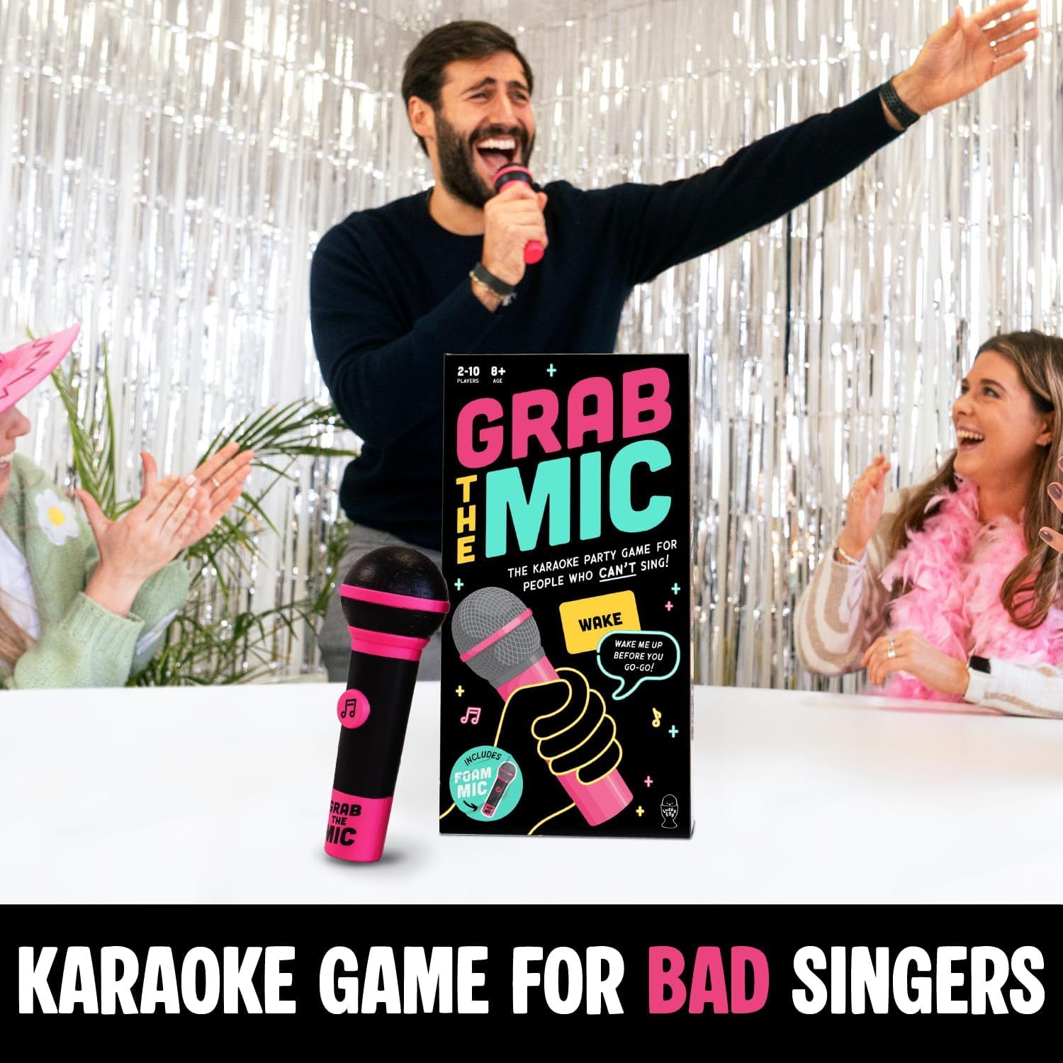 Shows the product being enjoyed in a real-world party setting with friends having fun, demonstrating the social entertainment value and joyful experience the karaoke game creates.
