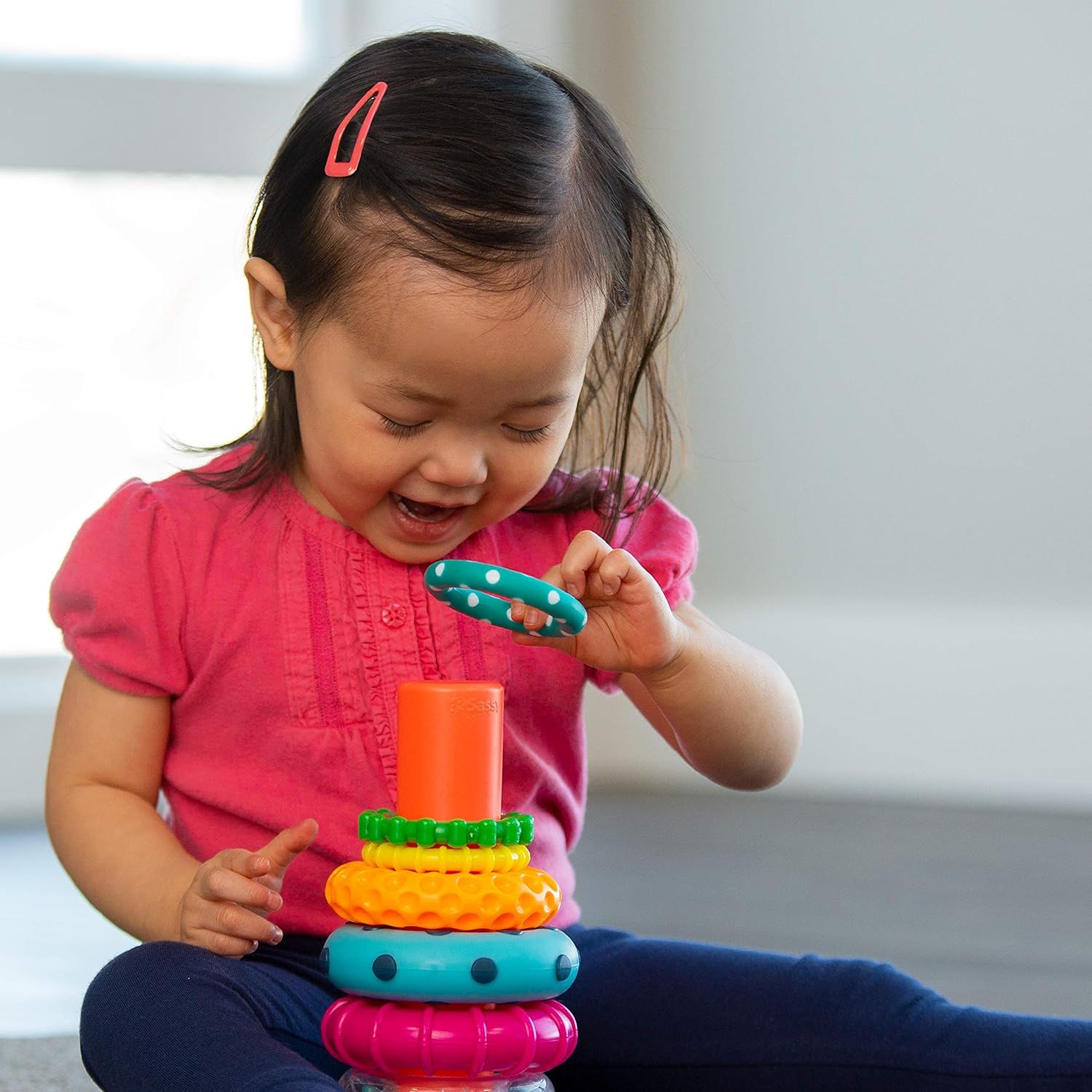 Demonstrates the product in use by a young child in a real-world home setting, showing engagement and developmental play to help parents visualize the…