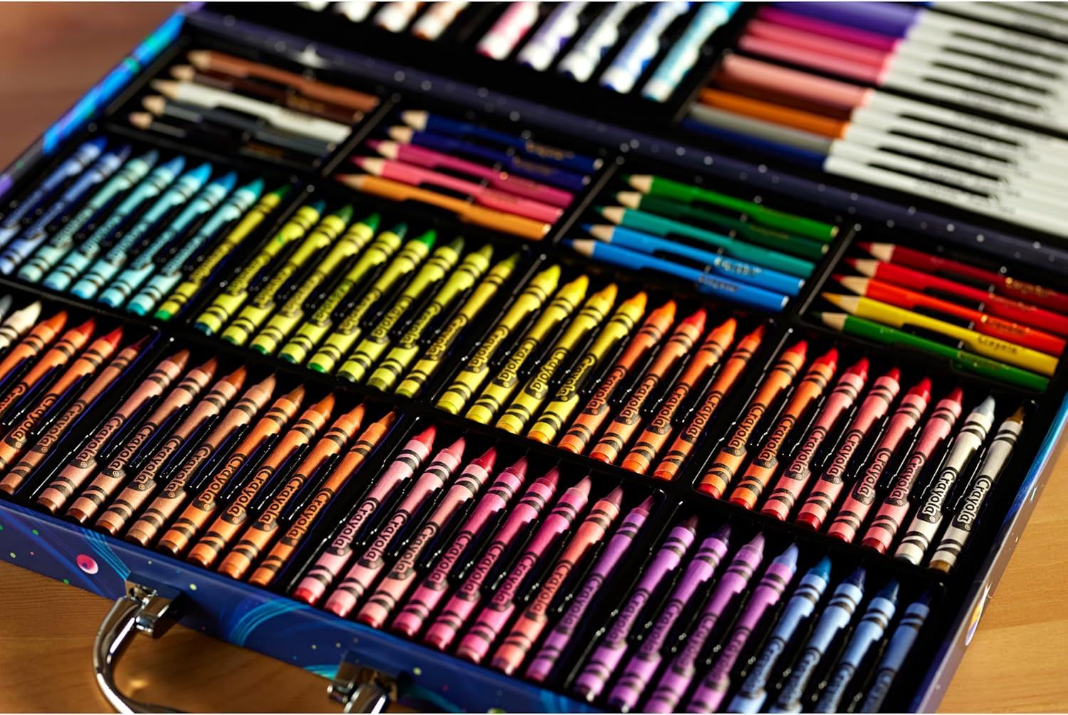 Shows the customer everything included in the art kit — colored pencils, crayons, markers, and other art supplies — to demonstrate the comprehensive value and variety of the bundle.