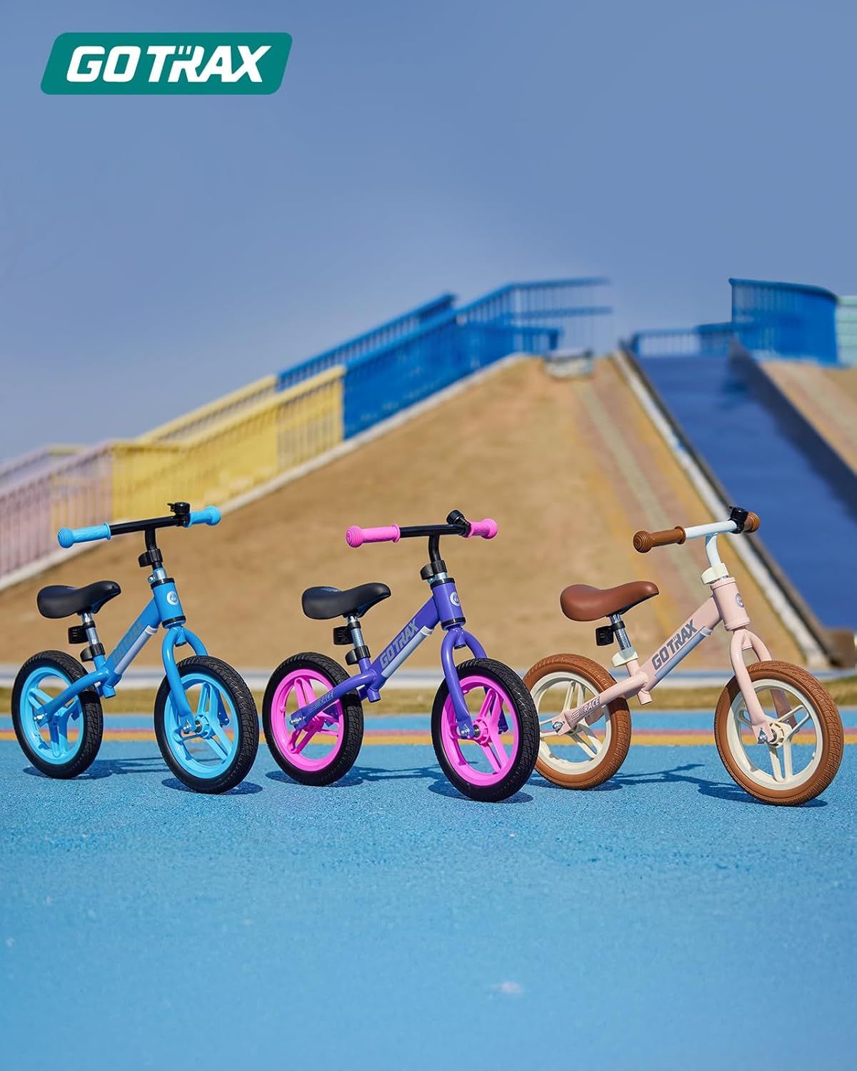 Showcases the brand's product lineup by displaying three different color variants of the balance bike, helping shoppers understand the available options and choose their preferred style.