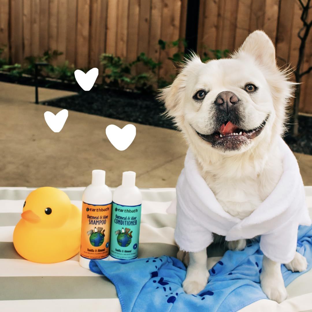 Shows the customer everything included in the pet grooming kit: shampoo, conditioner, and bath accessories, demonstrating the complete bathing solution. Depicts the product in a real-world bath time…