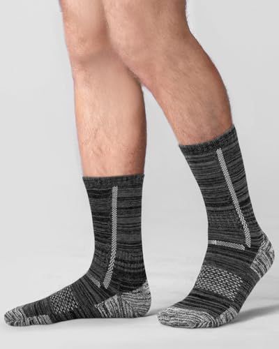 Displays the product clearly in a catalog-style format to show the design, pattern, and fit of the socks on a model.