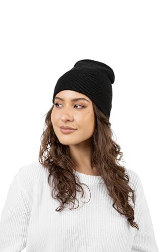 Shows the product being worn in a natural, real-world context to help shoppers visualize fit, style, and how the beanie looks when worn.