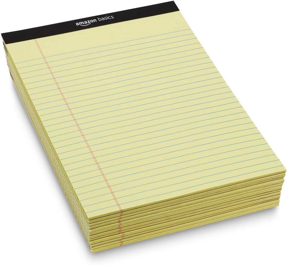 Provides a clean, catalog-style view of the Amazon Basics legal pad product on a white background with no distractions, allowing shoppers to see the product clearly.