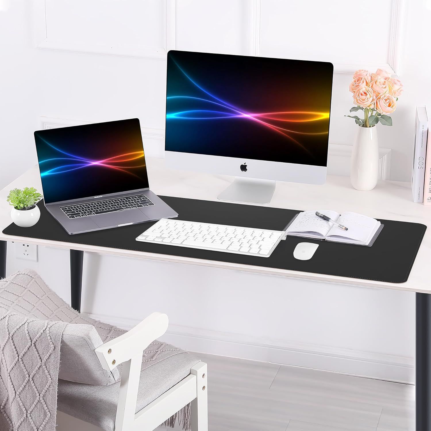 Demonstrates the product in a real-world home office environment to help shoppers visualize how the desk mat fits into a modern, clean workspace.